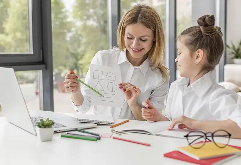 “Parents reviewing an Independent Educational Evaluation report before an IEP meeting”